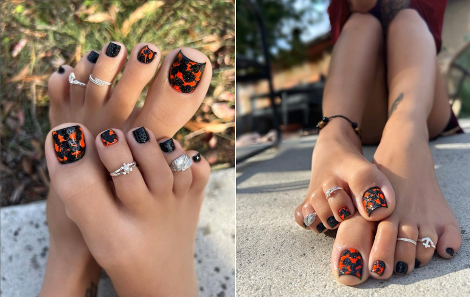 Black with orange pedicure toenails.